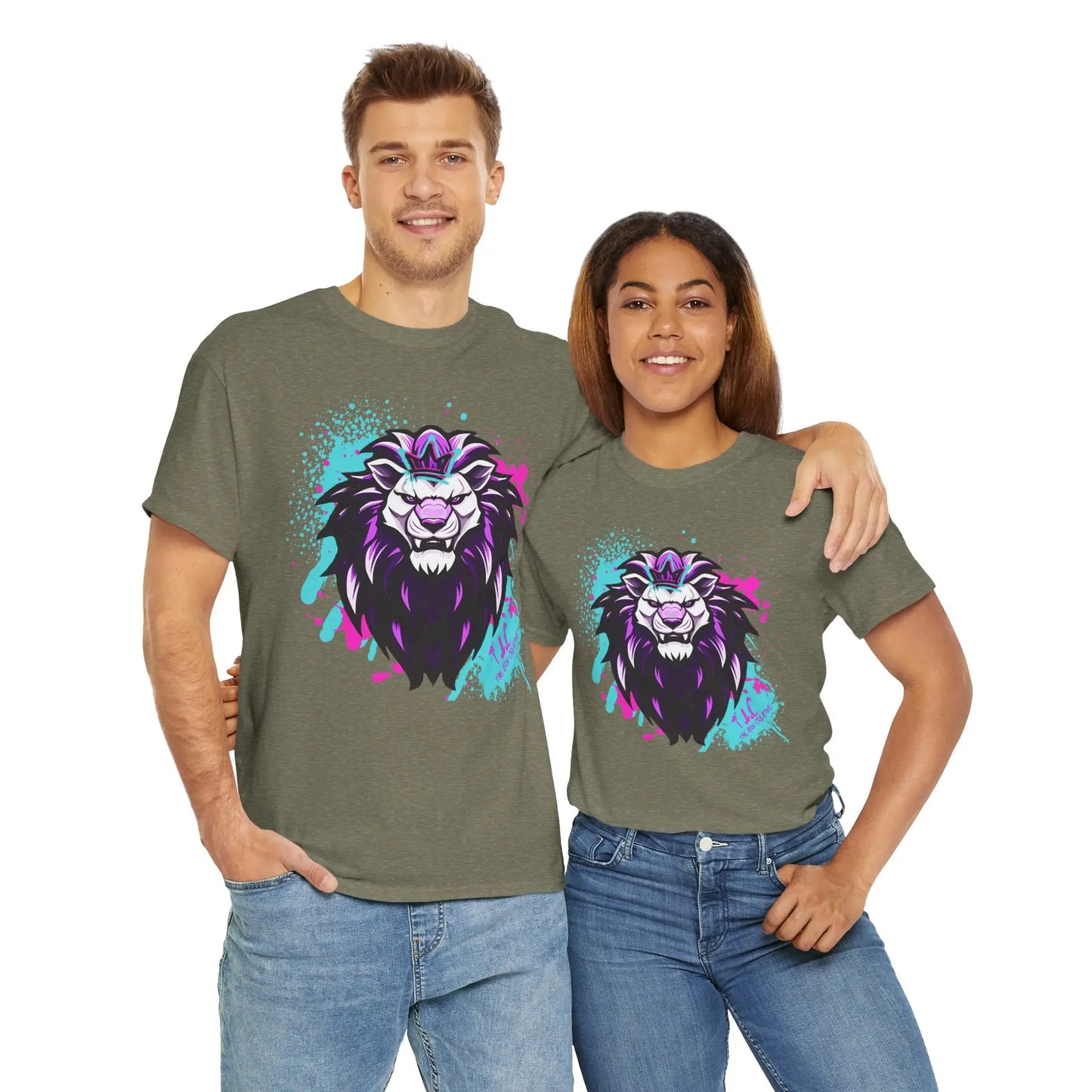 A man and woman stand side by side wearing The Lyon T-shirts in a classic fit gray design, crafted from 100% sustainable cotton. Each shirt features a vibrant and abstract lion artwork. With the man's arm around the woman's shoulder, they both grin while dressed in jeans against a pristine white backdrop.