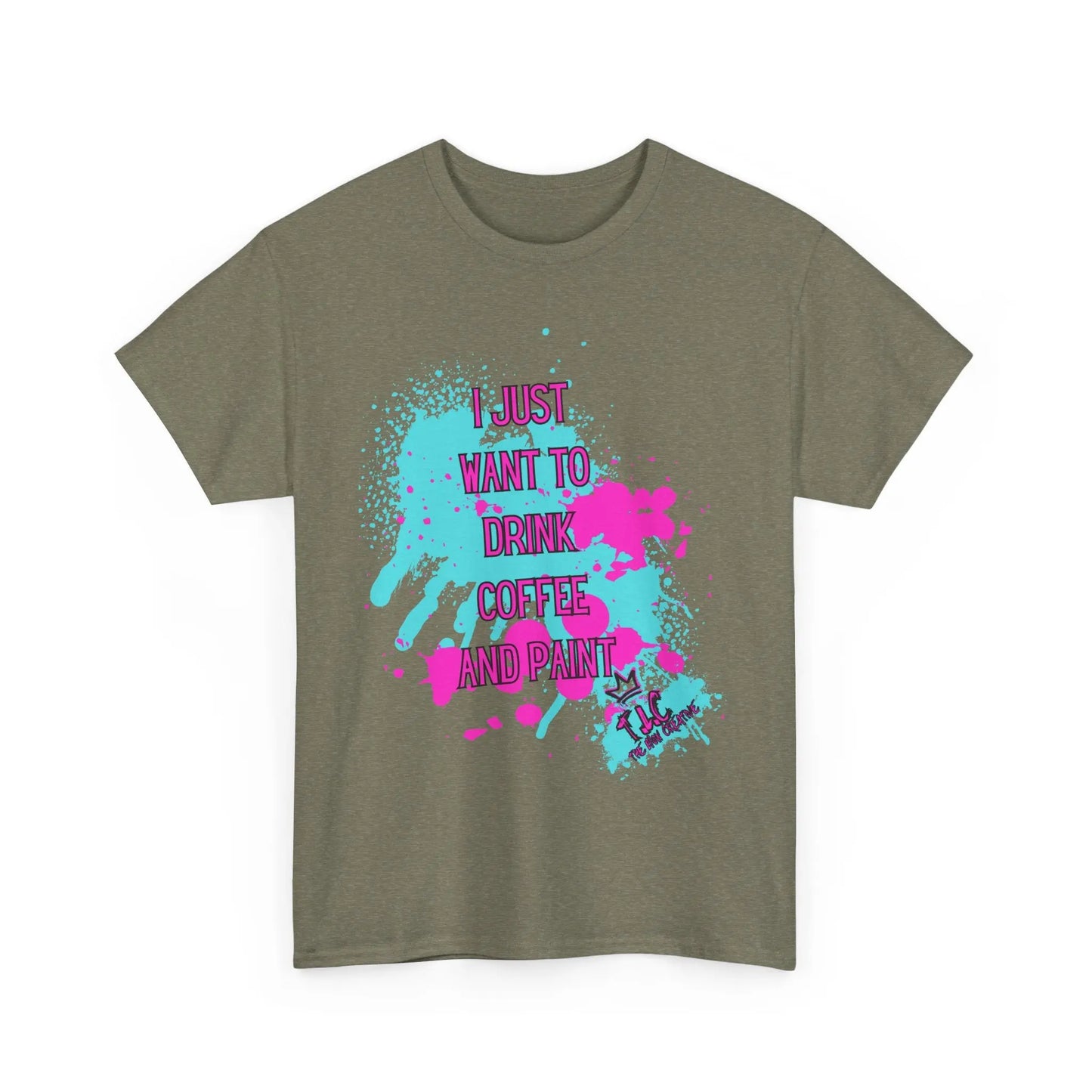 The "I Just Want to Drink Coffee" t-shirt comes in olive green and features a classic fit with a pink and teal paint splatter design. It is made from 100% cotton using sustainable production practices, adorned with the text "I just want to drink coffee and paint.