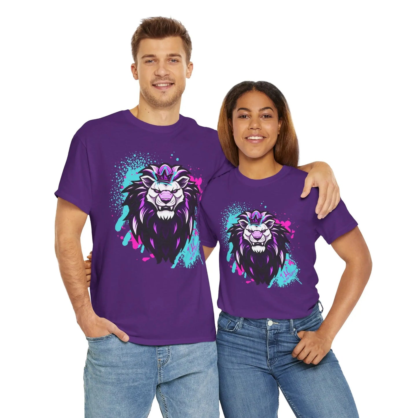 A man and woman smile while wearing matching "The Lyon T-shirt" in purple, made from 100% cotton with a classic fit. The shirts feature a vibrant, stylized lion graphic. The man has his arm around the woman's shoulder, as they both stand casually against a white background.