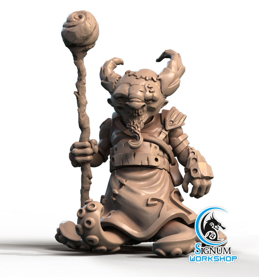 A detailed 3D printed miniature of a goblin wizard holding a staff. The goblin has large curved horns, a long beard, and is dressed in a robe with armor pieces, perfect for Dungeons and Dragons. The base of the figurine features the Merkaar Tentacules - Signum Workshop - 3d Print logo.