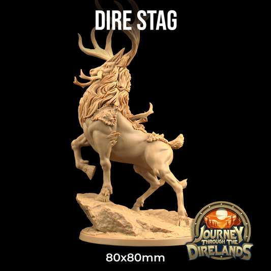 A detailed 3D printed miniature figure of a rearing dire stag, standing on a rocky base. The figure features intricate details of the stag’s fur, antlers, and musculature. Perfect for Dungeons and Dragons enthusiasts, it’s captioned "Dire Stag - The Dragon Trappers Lodge - 3d Print" at the top with a logo reading "Journey Through The Direlands" at the bottom.