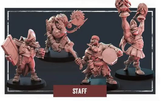 The collection includes four intricately designed fantasy resin miniatures, ideal for wargaming, depicting unique Storm Coast Marauders: one character adorned with a hood and carrying a book, another brandishing a large weapon, a bearded figure equipped with a drum, and a humanoid creature clutching a severed head. These miniatures are labeled "Storm Coast Marauders - Staff.