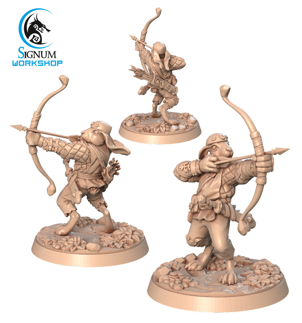 Three detailed resin miniatures from Signum Workshop depict anthropomorphic frogs armed with bows and dressed in medieval-style adventurer gear. Perfect for Dungeons and Dragons, two figures stand poised to shoot, while one carries a quiver of arrows on their back. They are set on textured bases. The product is named Sir Robbin Long-Eared - Signum Workshop - 3d Print.